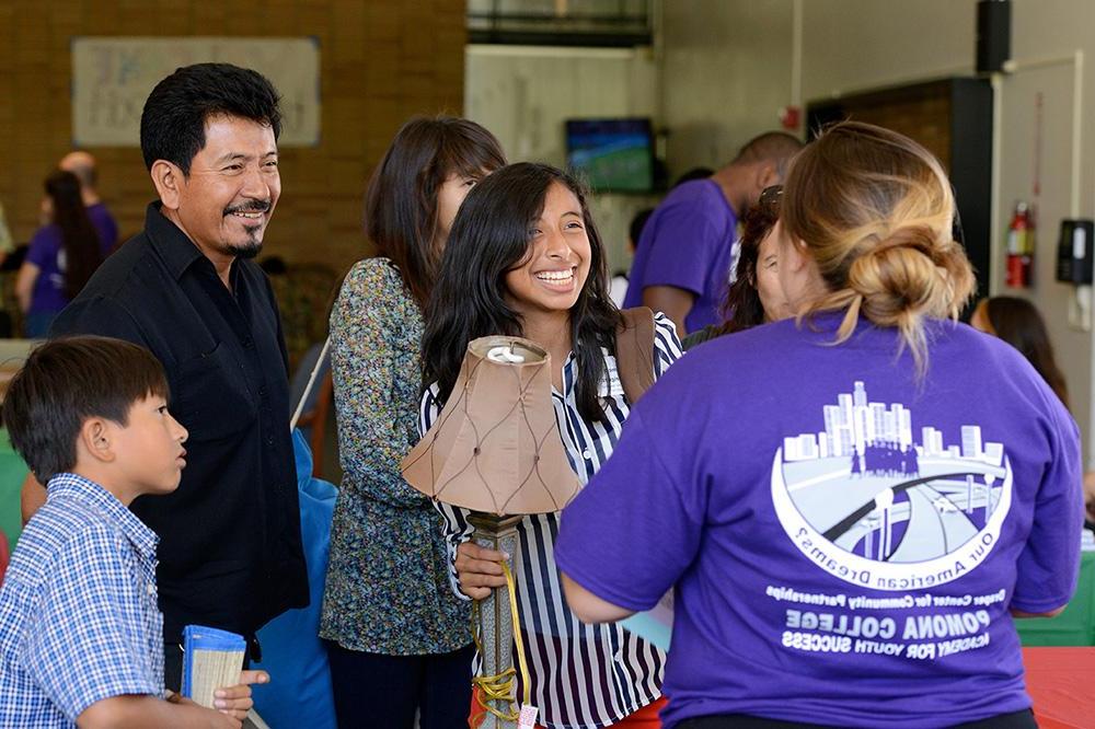 High school students being welcomed as they arrive on campus for the PAYS program